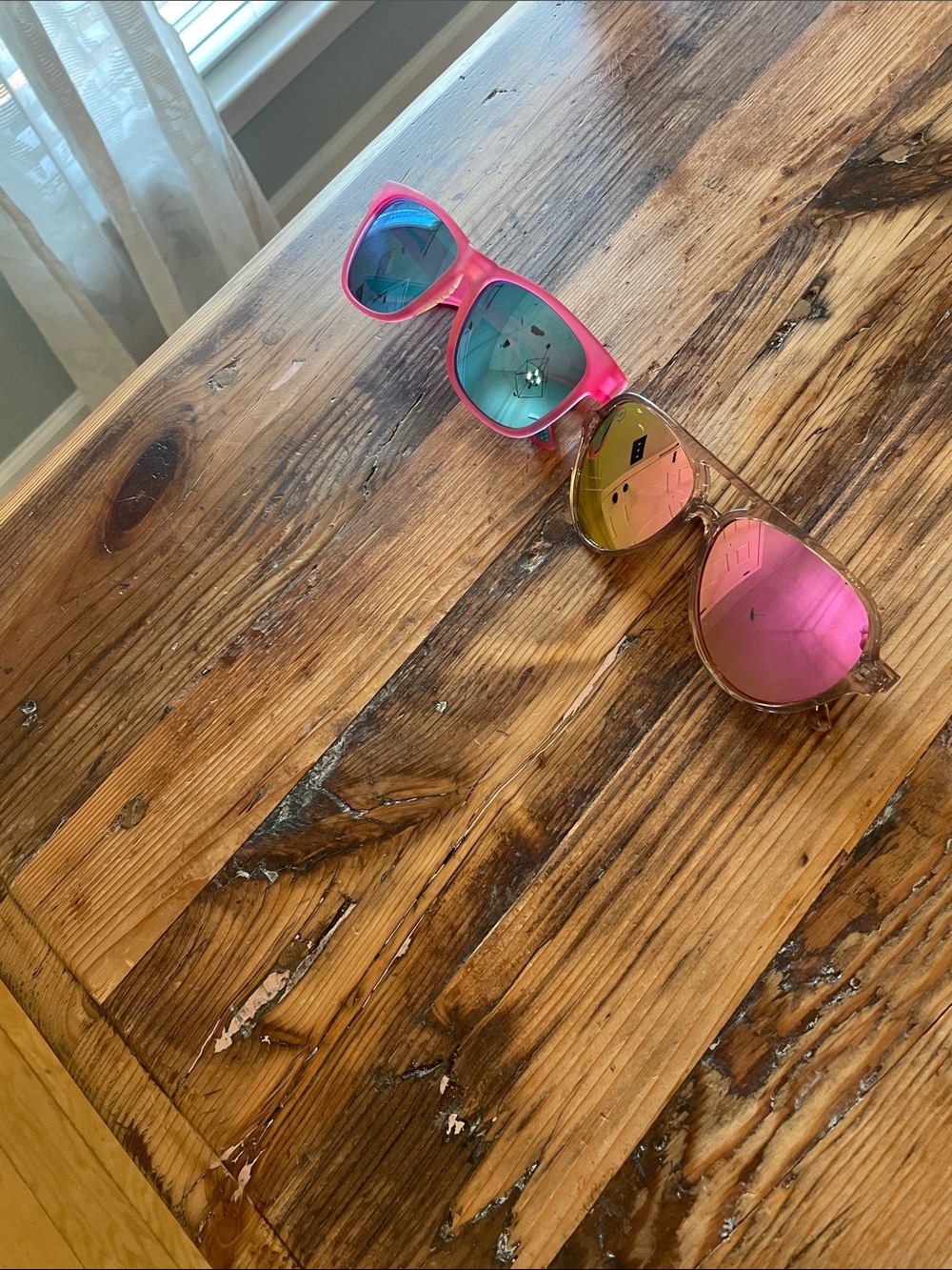 2 sunglasses Goodr and Blenders